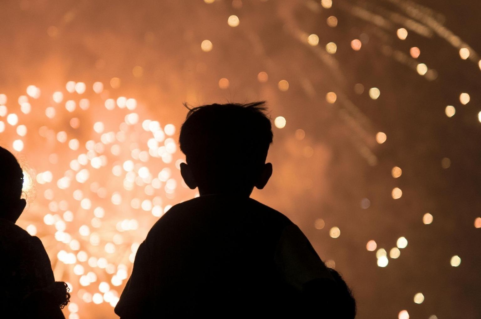 Children watching the New year's Eve fireworks