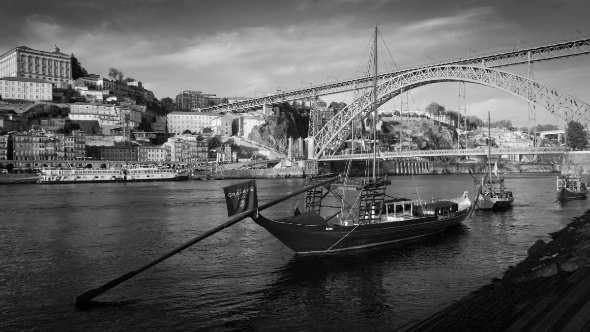 Douro River, Rabelo Boats, Porto skyline, and iconic bridge on our Private Porto City Tour | Cooltour Oporto