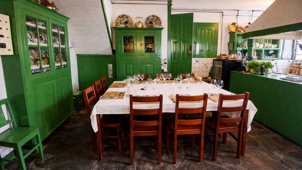 A beautifully set table where your meal is served at the estate