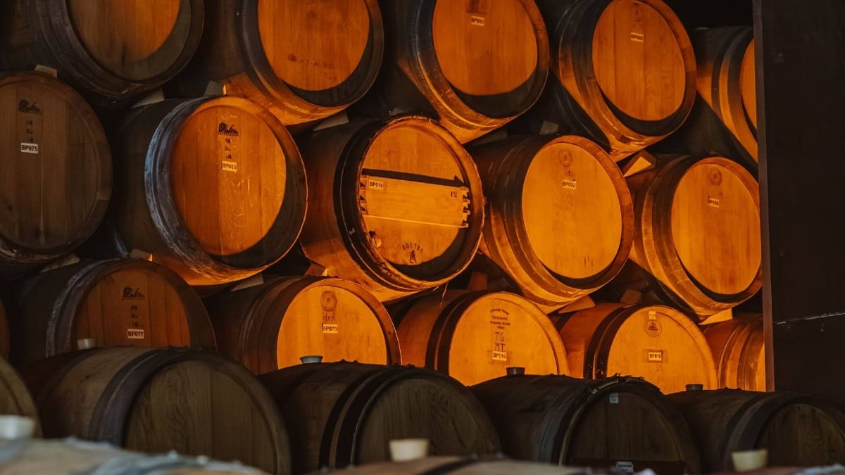 Traditional oak barrels play a key role in shaping the character of the estate's wines