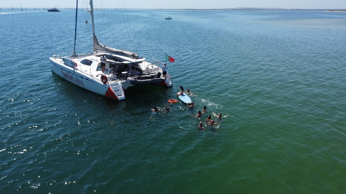 4UlM catamaran guests enjoying ocean and sup