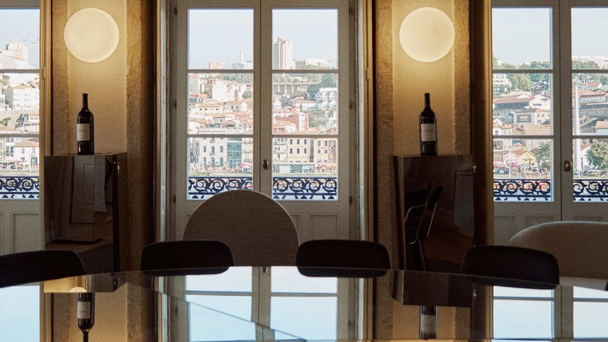 Inside tasting room with a view towards Vila Nova de Gaia and the Port wine cellars