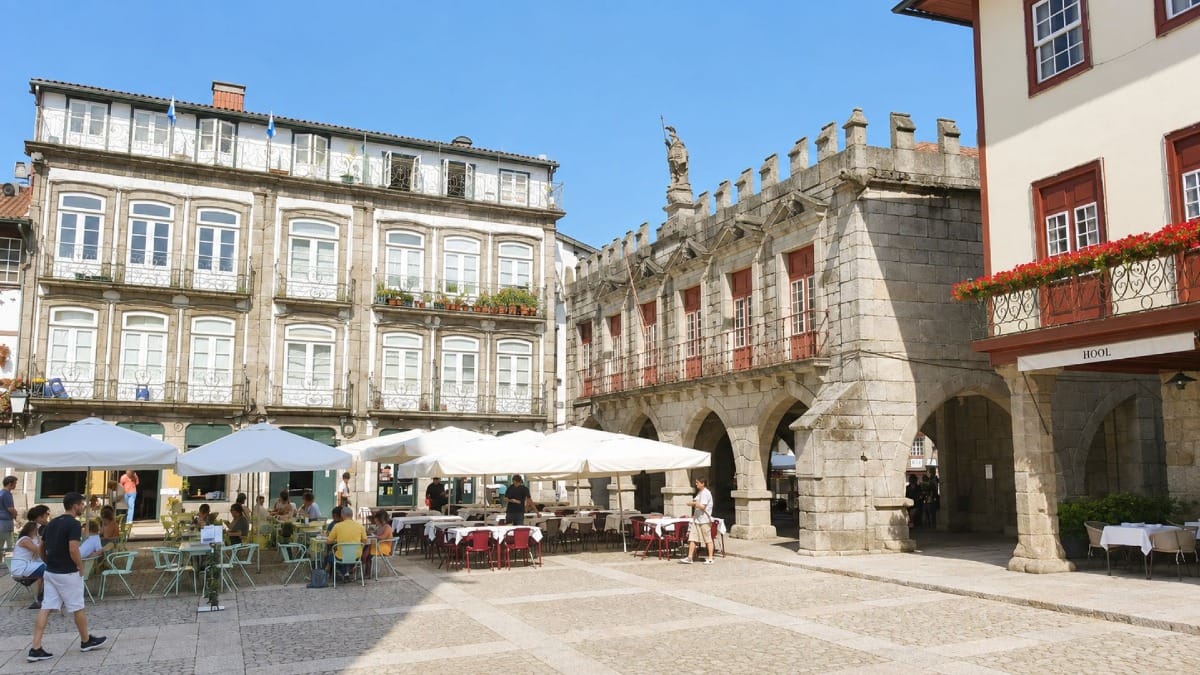 Praça da Oliveira and the Old Town Council Chambers in Guimarães' UNESCO-listed historic centre.