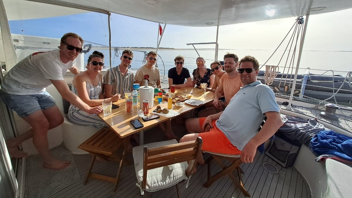 Qn1a faro catamaran boat tour guests photo