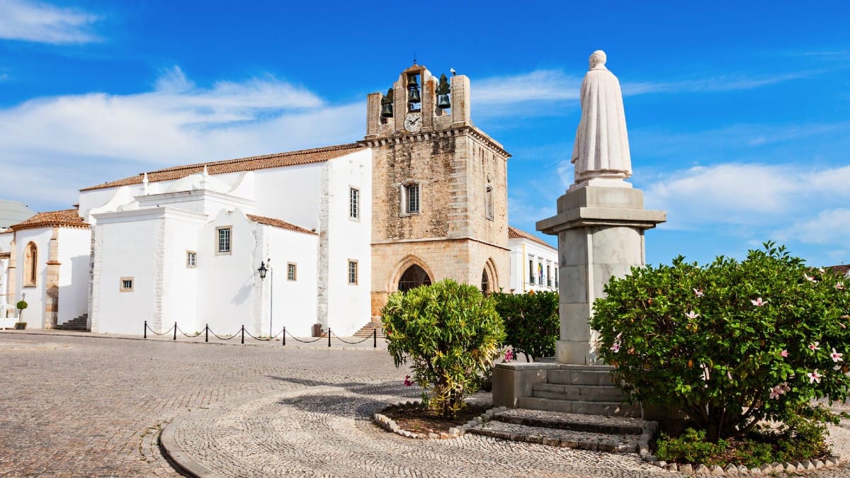 Faro Cathedral and Largo da Sé square seen on a sunny day in the city’s historic center
