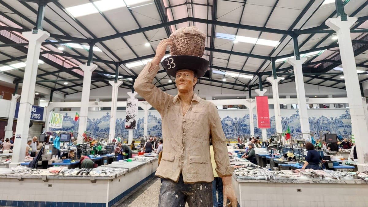 Interior of Mercado do Livramento in Setúbal with traditional azulejos and fresh produce stalls