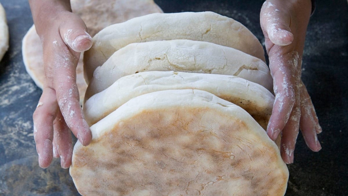 Taste freshly baked bolo do caco, a must-try Madeiran specialty