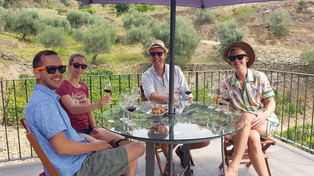 Morning wine tasting on a terrace overlooking the Douro Valley after a guided winery visit with Cooltour Oporto
