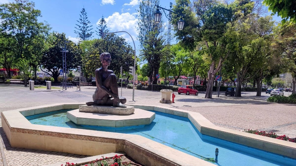 Statue and fountain along Avenida Luísa Todi, one of the main boulevards in Setúbal
