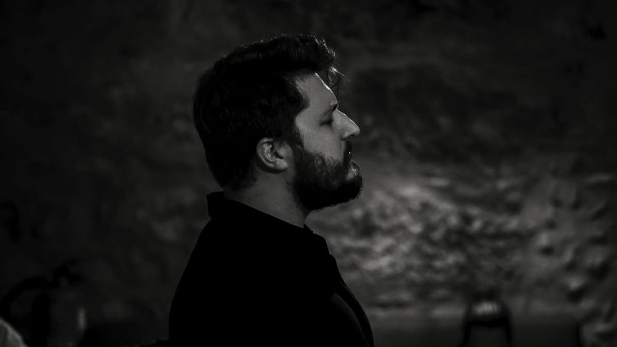 Close-up of a Fado singer performing this traditional Portuguese music in Porto