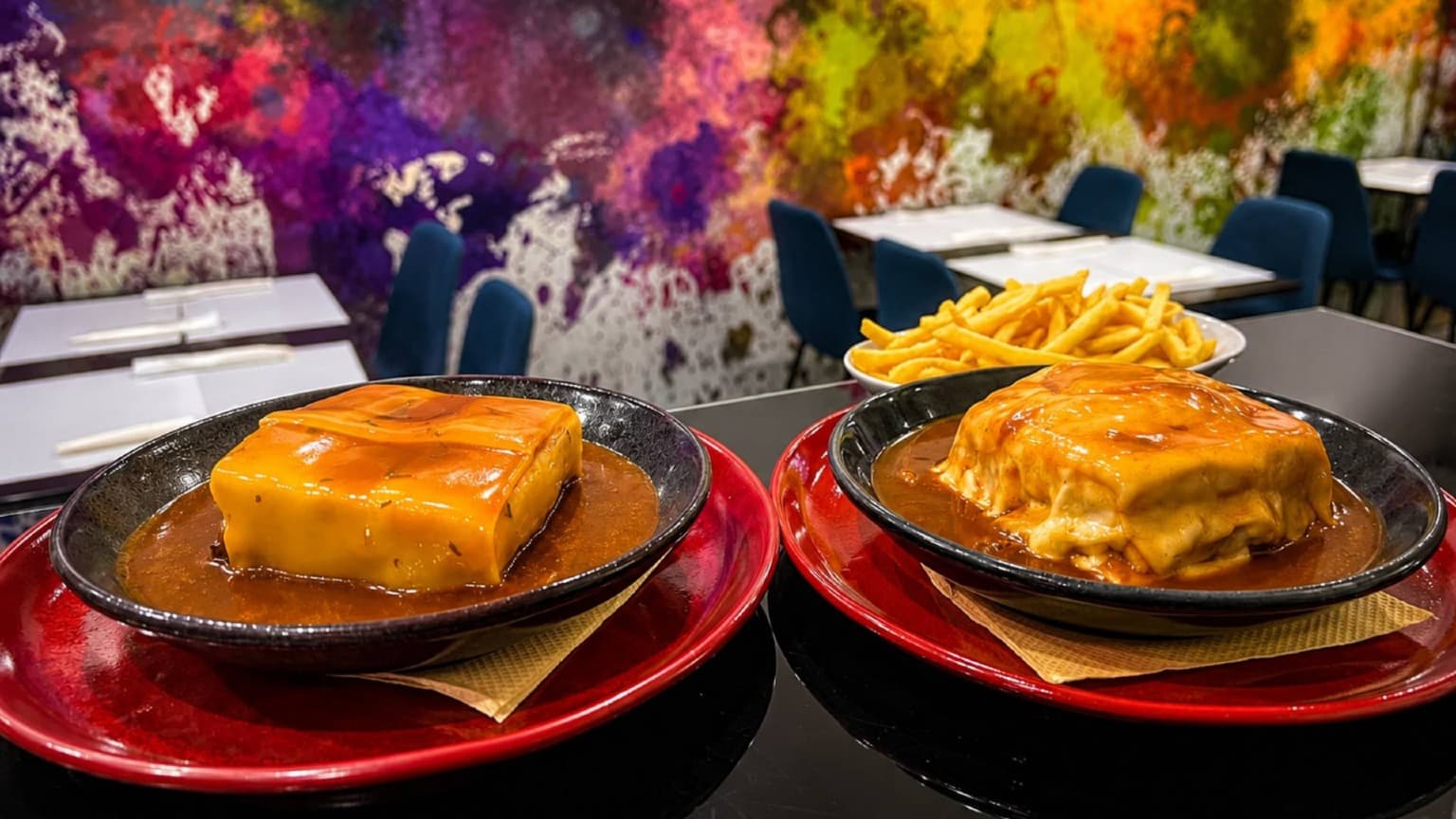 Vegetarian Francesinha served at Casanova restaurant in Porto with melted cheese and French fries