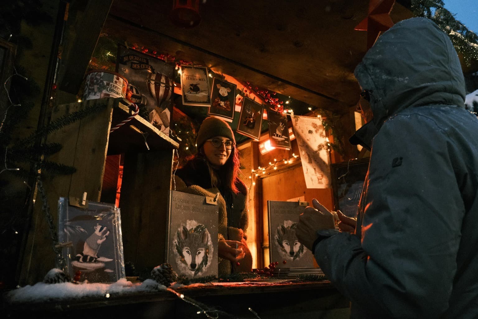 Joyful Christmas Market vendor showcasing festive crafts and decorations amid twinkling lights and holiday spirit