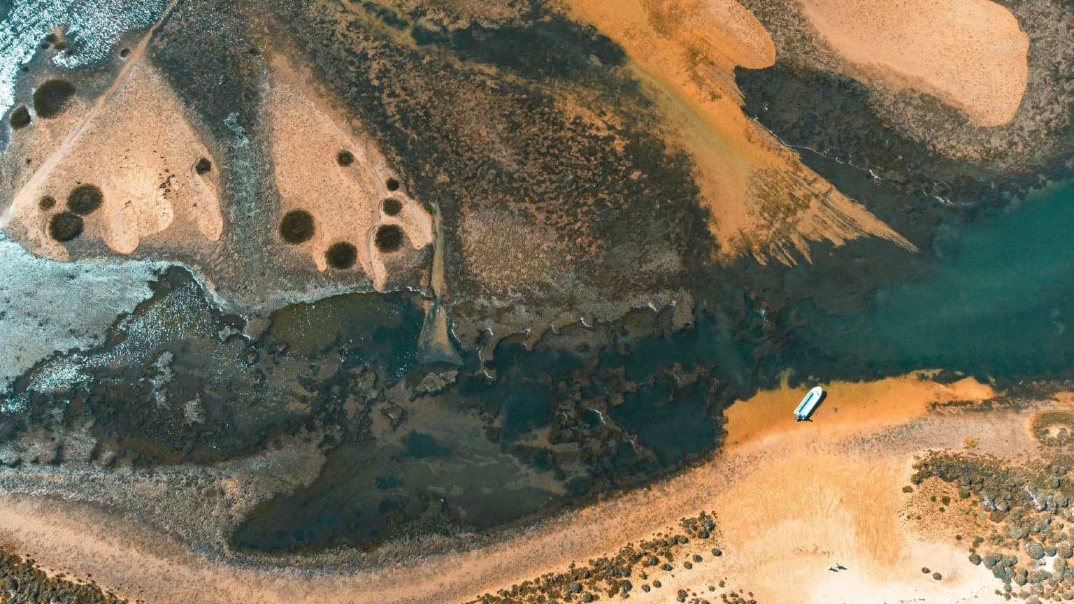 Ilha de Tavira, a sandy paradise accessible by boat with calm waters and pristine beaches.