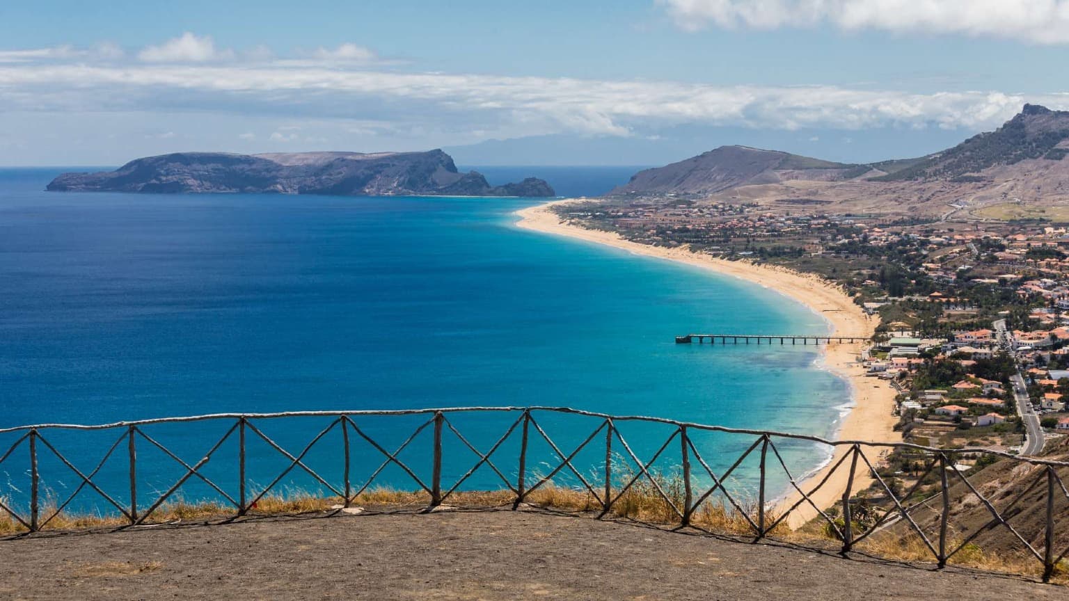Panoramic view over Porto Santo’s long golden-sand beach and turquoise waters