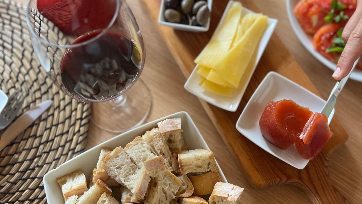 Traditional marmelada, cheese, and local wines served at Casa do PoƧo on our tour